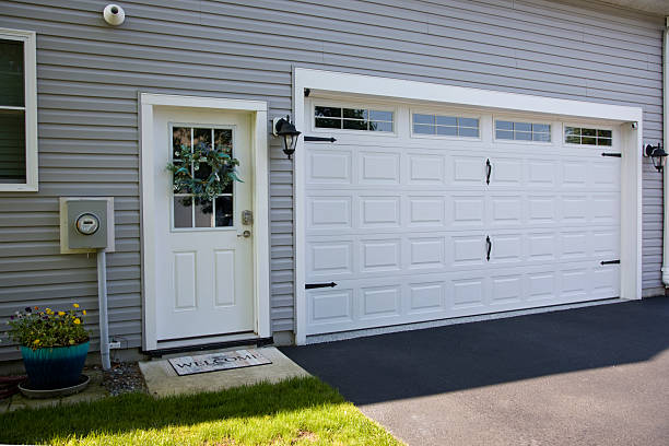 24/7 Emergency Garage Door Panel Replacement experts in Riley, KS